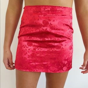 Princess Polly red skirt with rose pattern